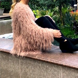 Unique Fuzzy pink cardigan.